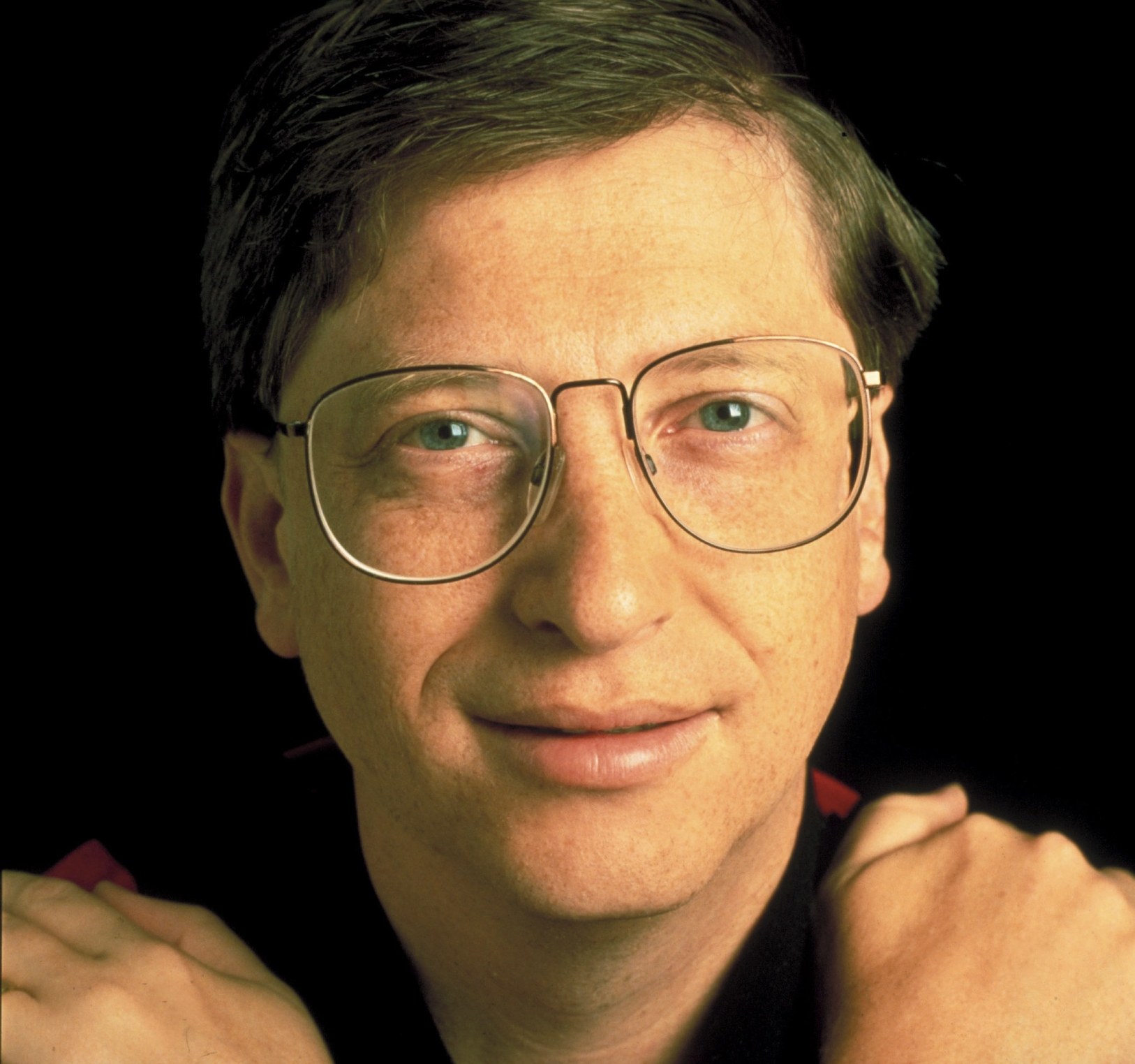 A close-up portrait of young Bill Gates